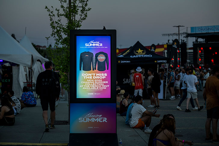 Digital signage with merch being advertised